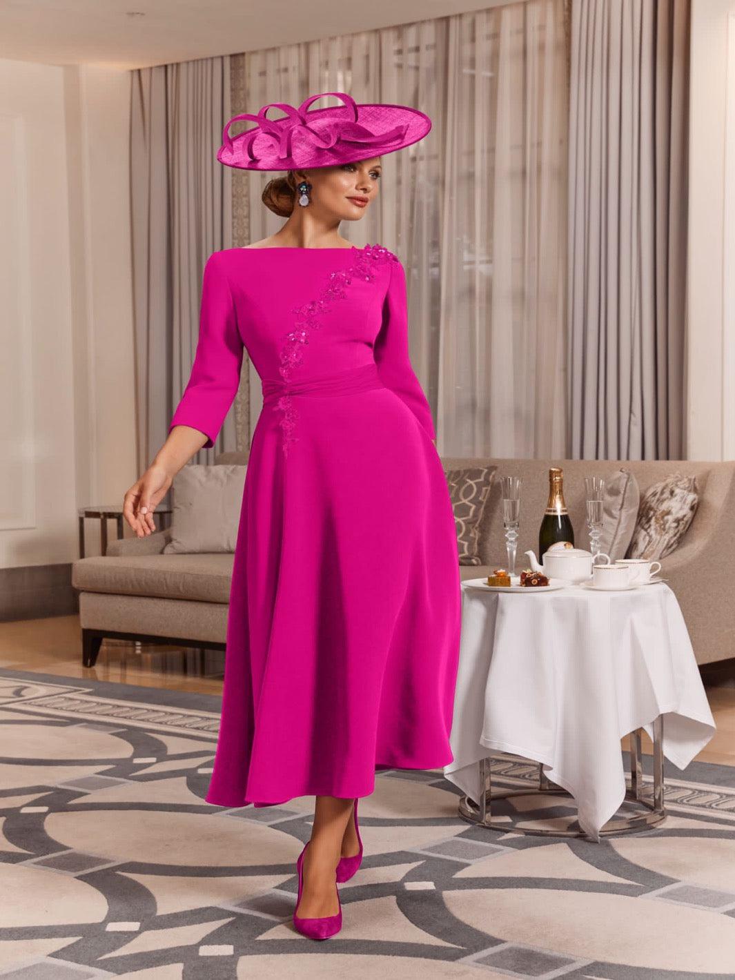 Cerise pink mother of the store bride outfit